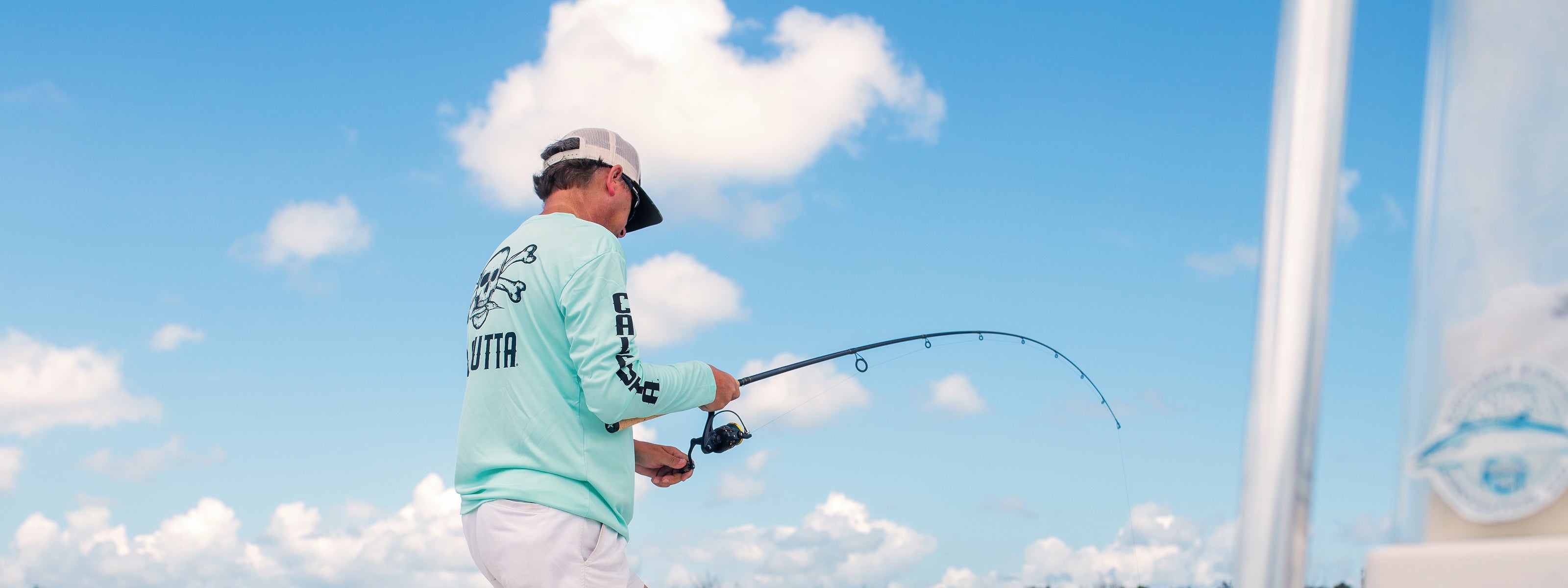 Fisherman with Kunnan rod and reel combo