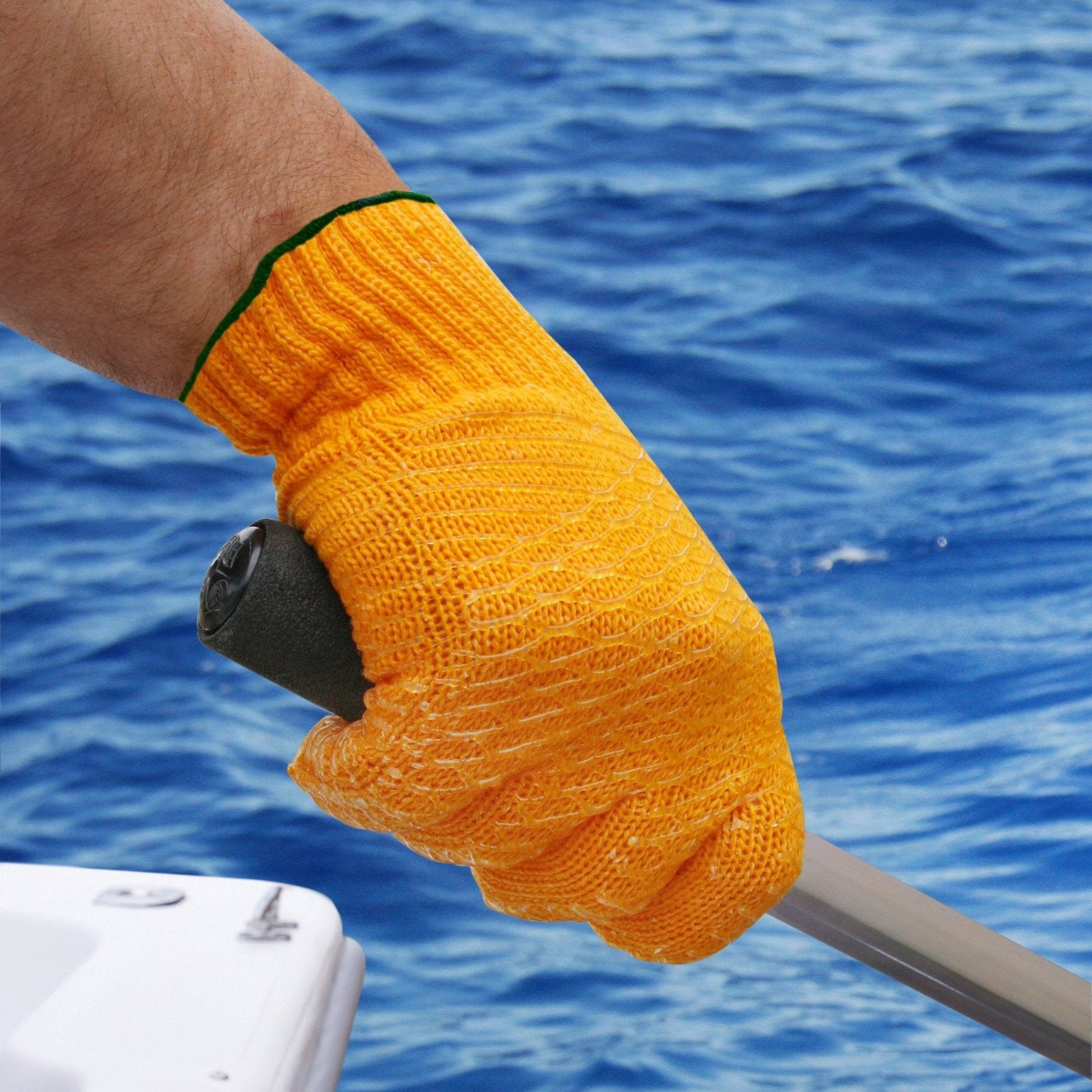 Sea Striker orange string knit fishing gloves with gaff