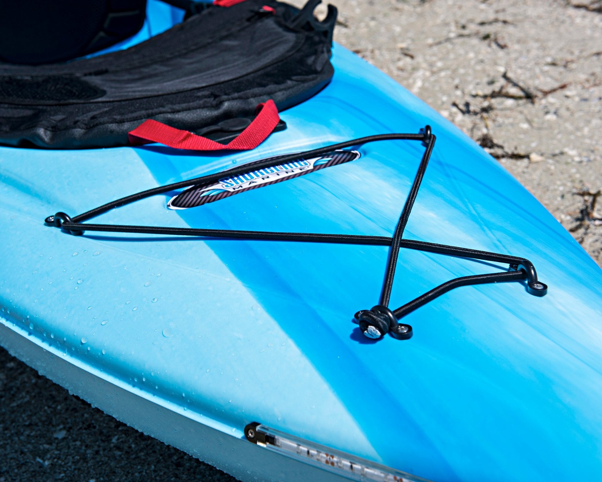 Propel Paddle Bungee Deck Kit installed on kayak