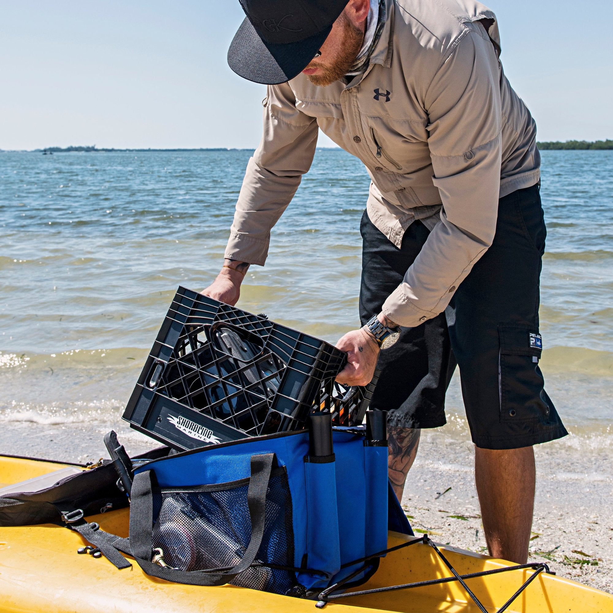 Crate being placed in Propel Paddle kayak bag