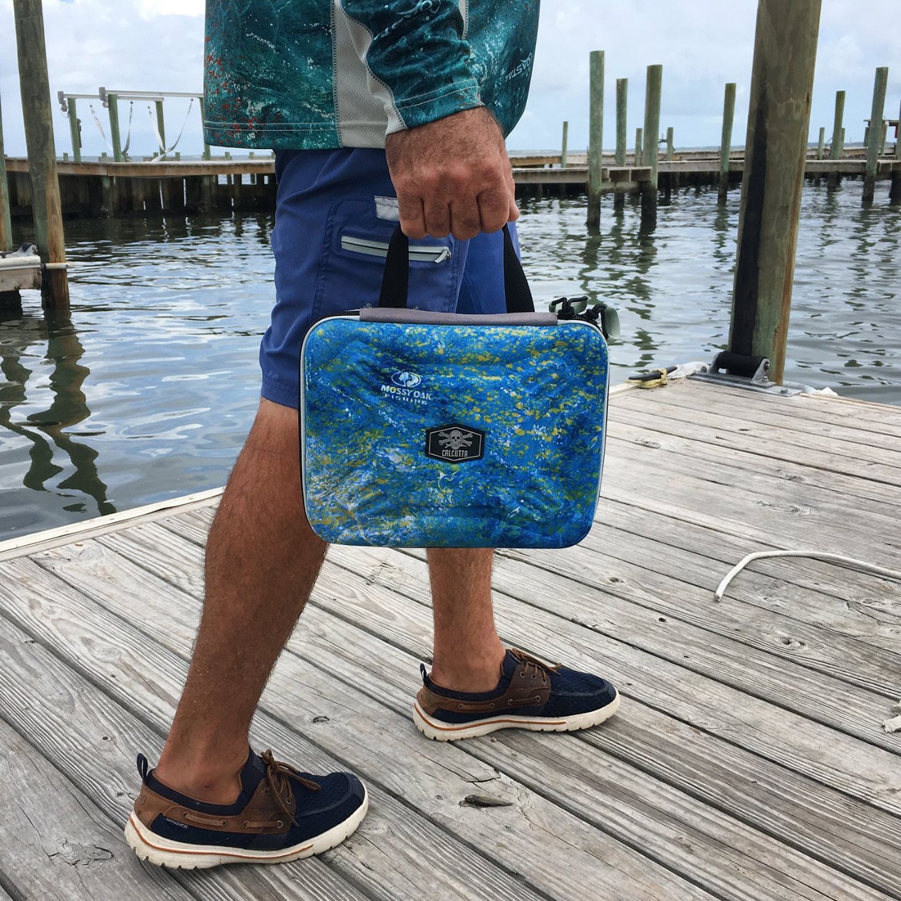 Fisherman carrying the Calcutta bait binder